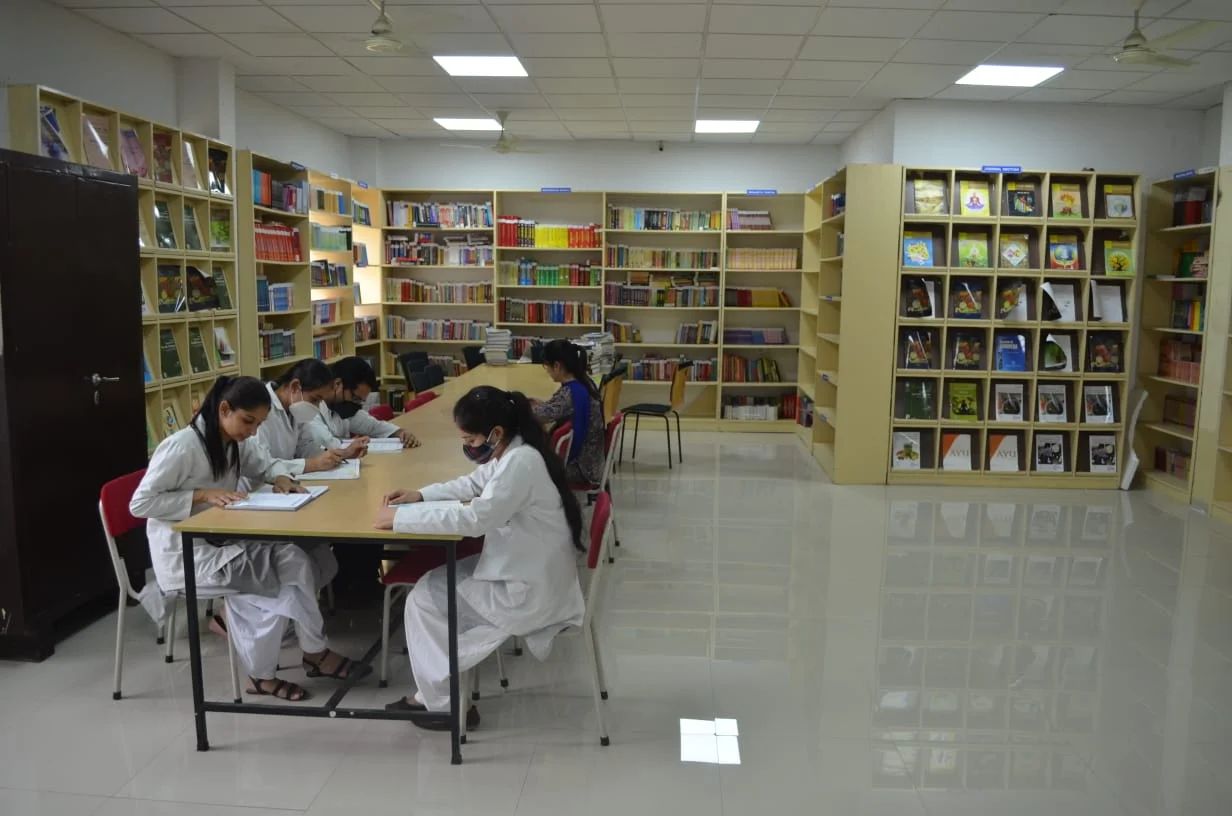 Five Person Sitting in Library of GS Ayurveda Medical College & Hospital